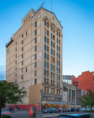 An exterior street-level photograph of The Belle.