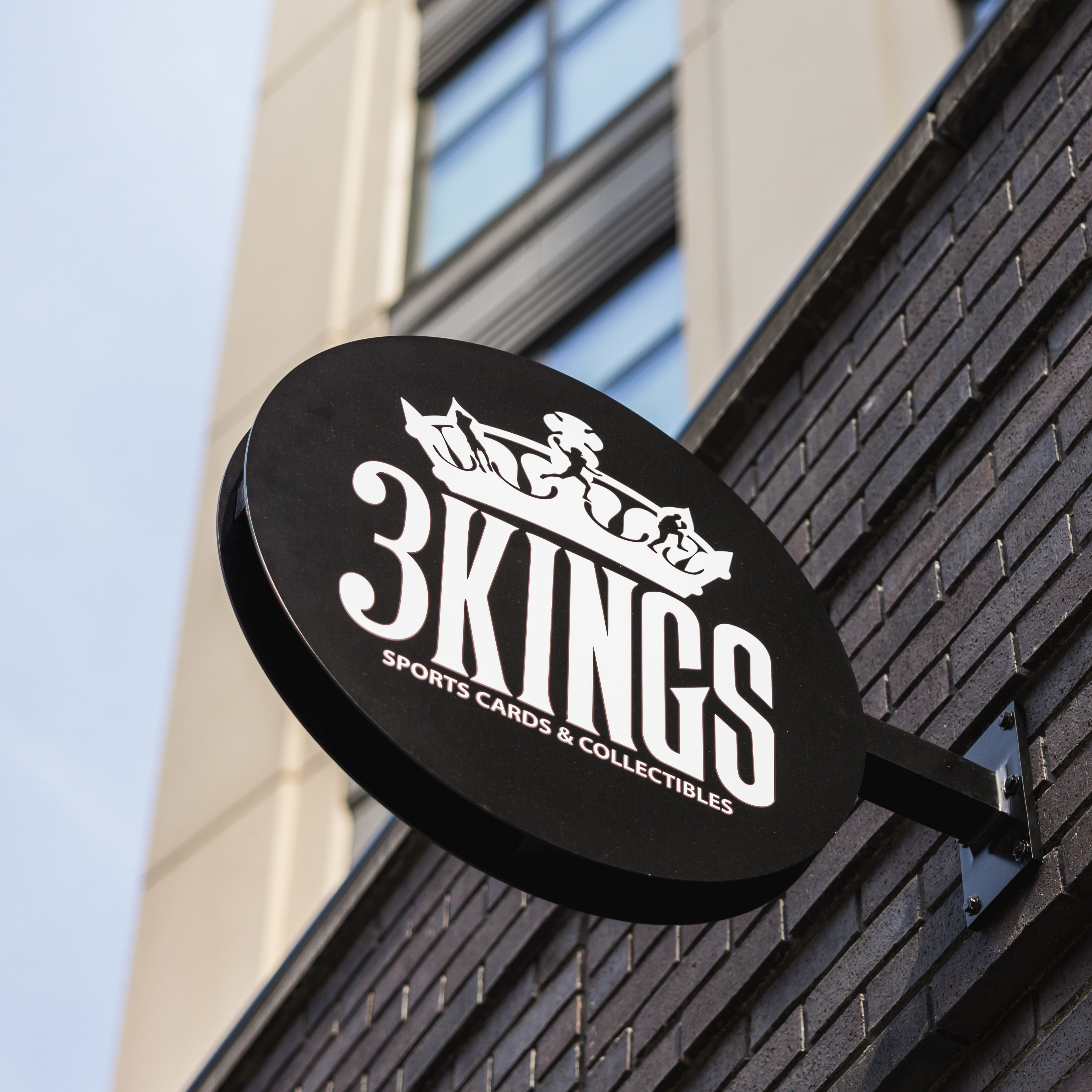 Exterior signage of 3 Kings Sports Cards. 