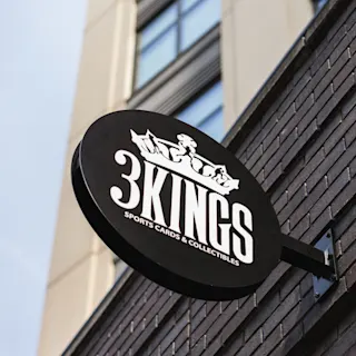 Exterior signage of 3 Kings Sports Cards. 