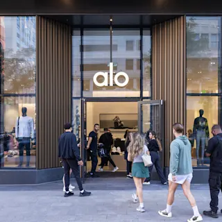 An exterior photograph of the Alo grand opening at Hudson's Detroit, featuring activation (square ratio).