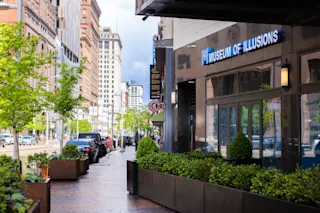 An exterior photo of the Museum of Illusions at The May.