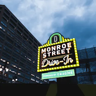 Street view of Monroe Street Drive In sign. 