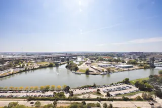 An aerial photo of the Downtown Cleveland Riverfront, featuring parking.