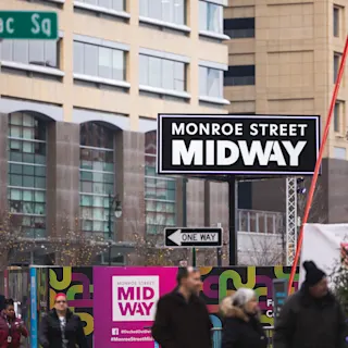 Street view of the Monroe Street Midway signage. 