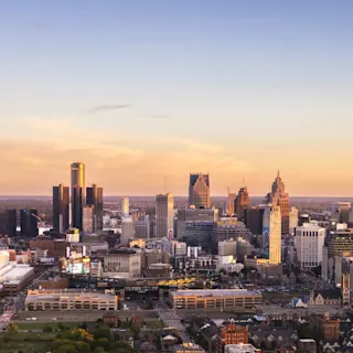 Aerial view of Detroit skyline at sunset. 