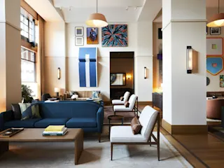 Living room with modern furnishings at Shinola Hotel. 