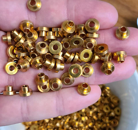 brass-touch-pads-in-hand