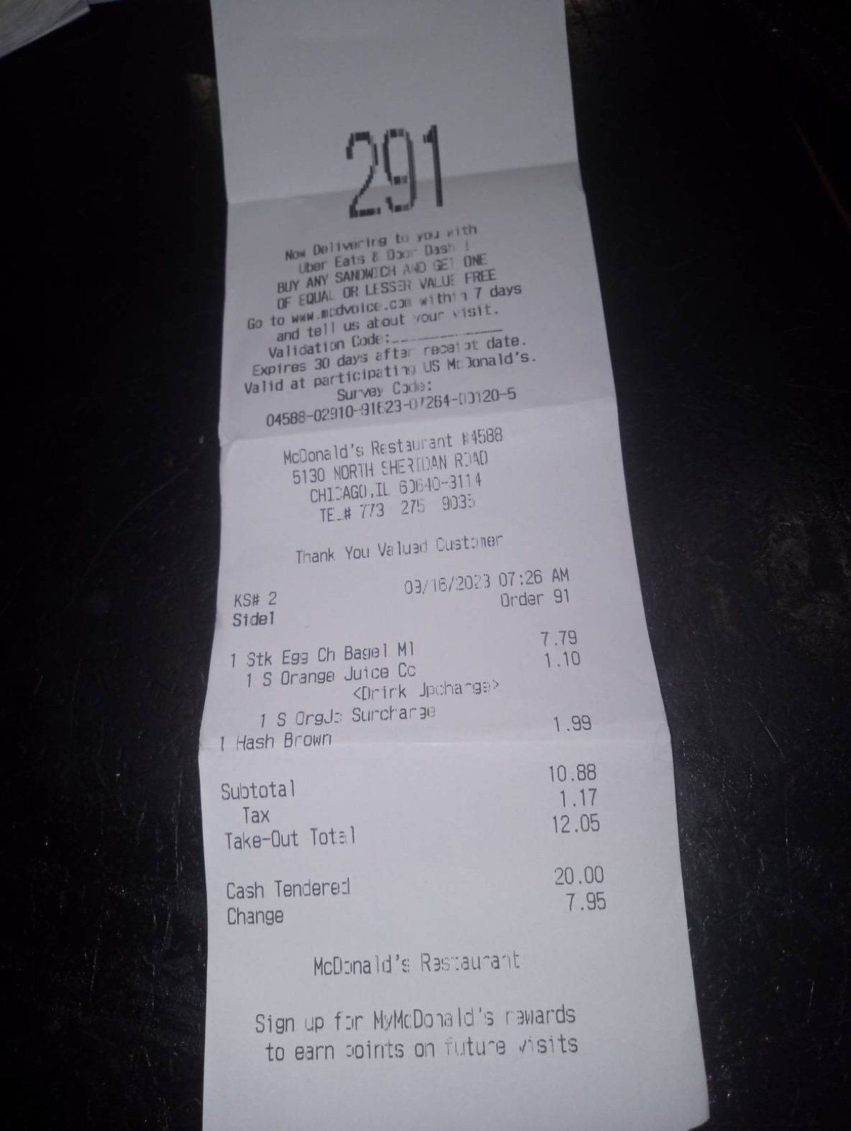 Real anonymized McDonald's receipt for $12.05 paid in cash, well under the IRS $75 threshold so no documentary evidence is required