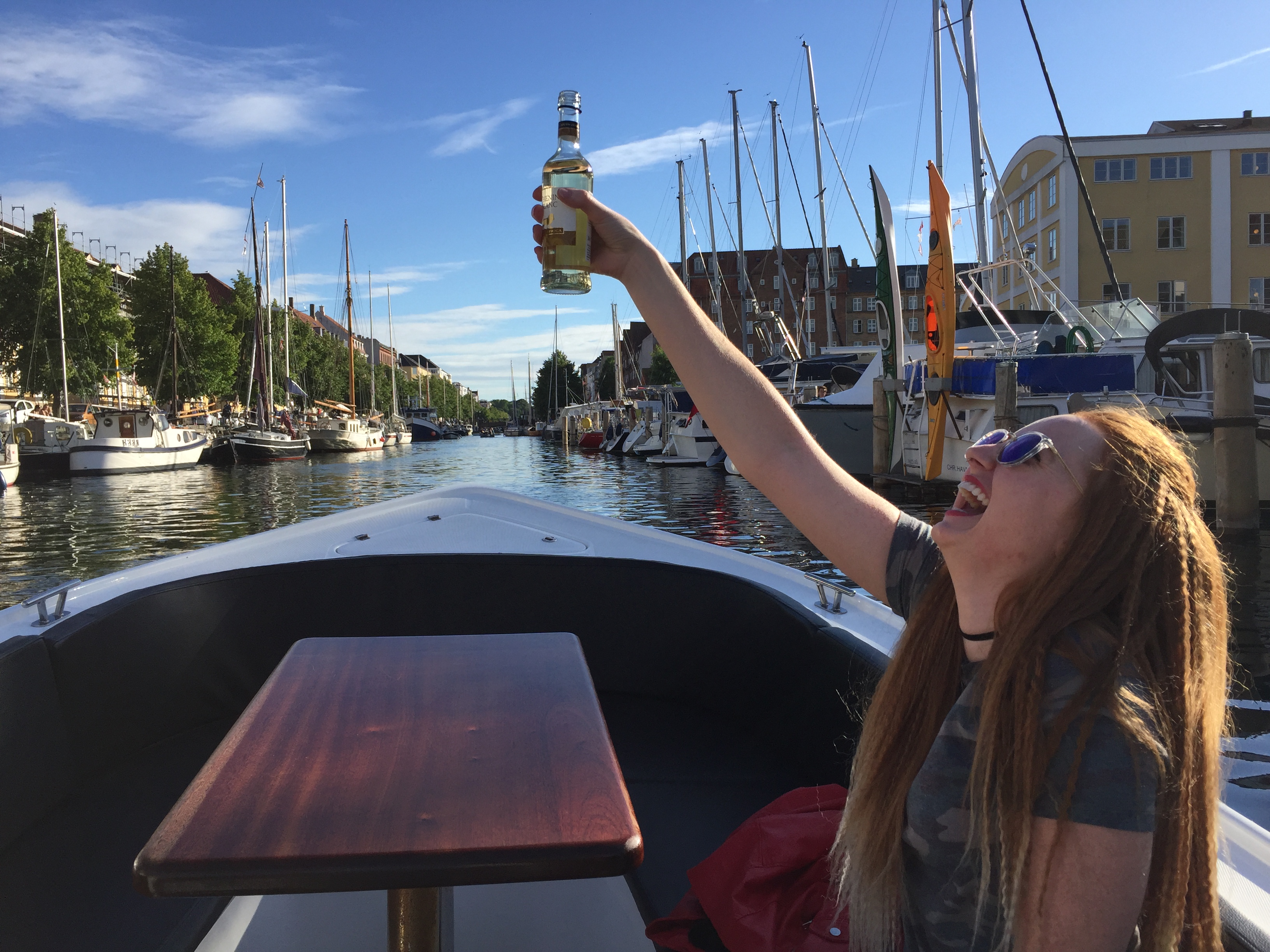 Woman Toasting on the canals of Copenhagen