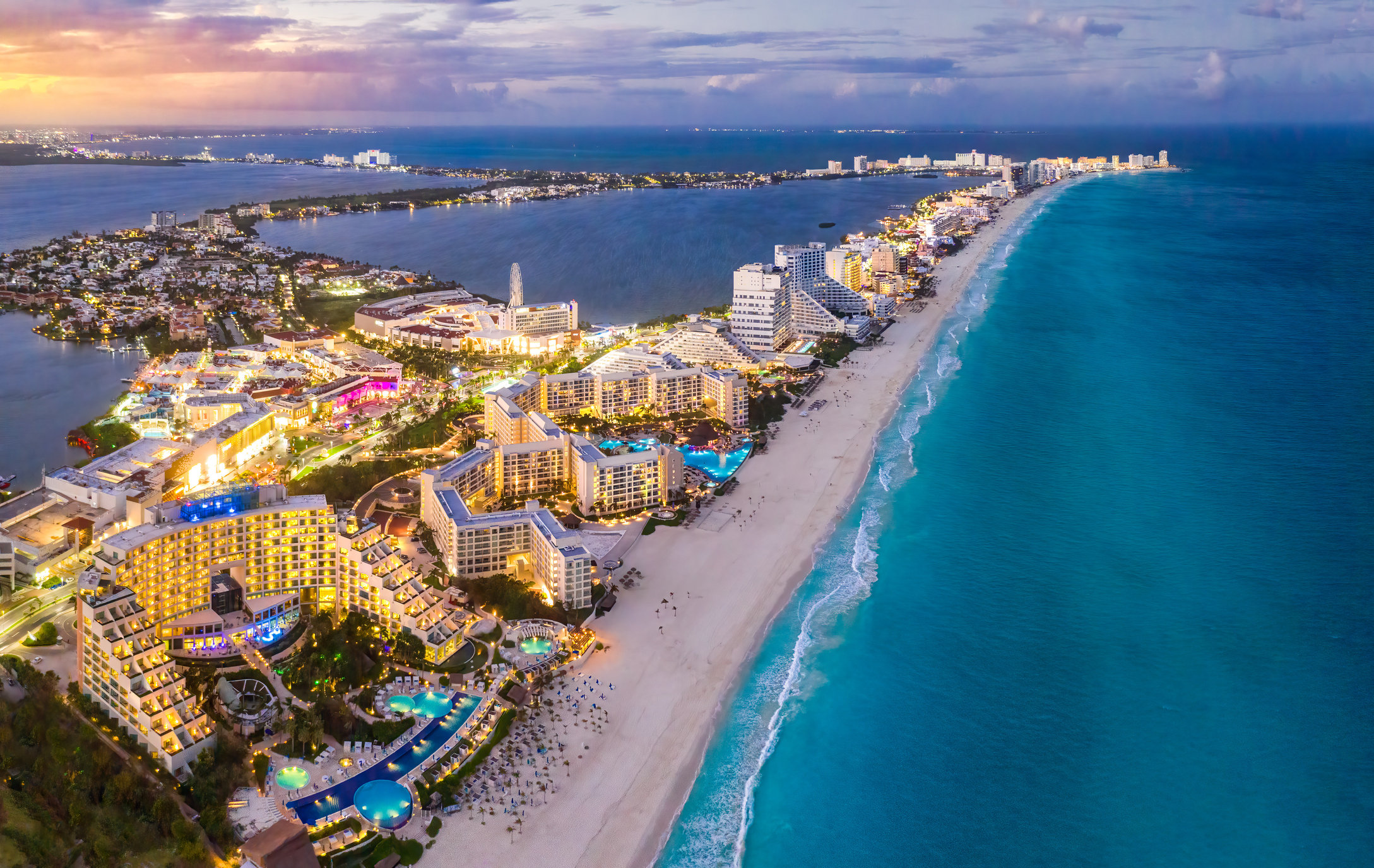 A photo of the skyline of Cancun at night.