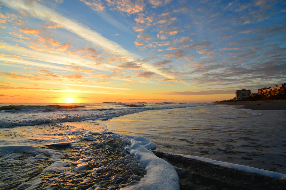 A photo of a beach in Melbourne, FL at sunrise.