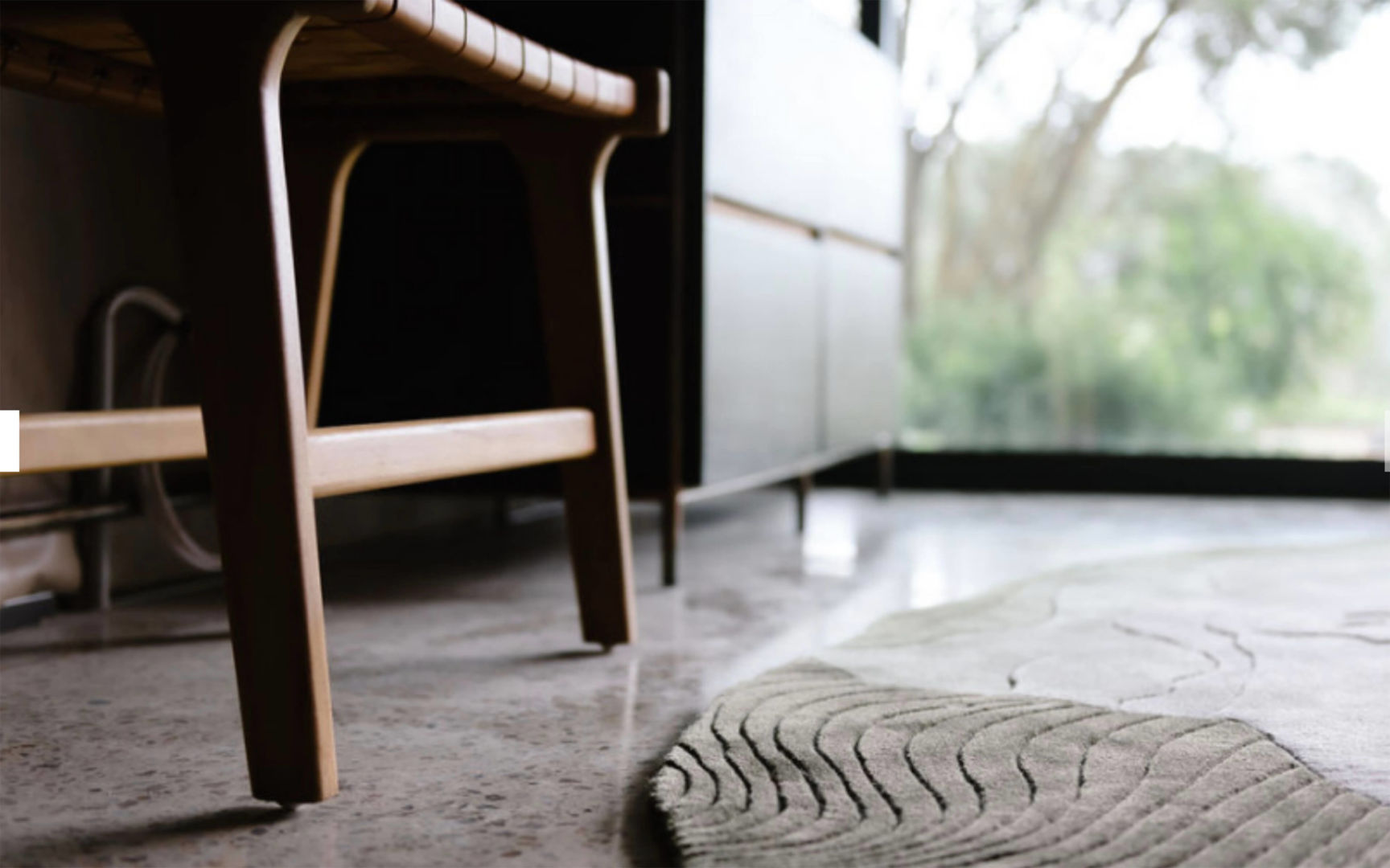 interior styling_textured rug_concrete floor 