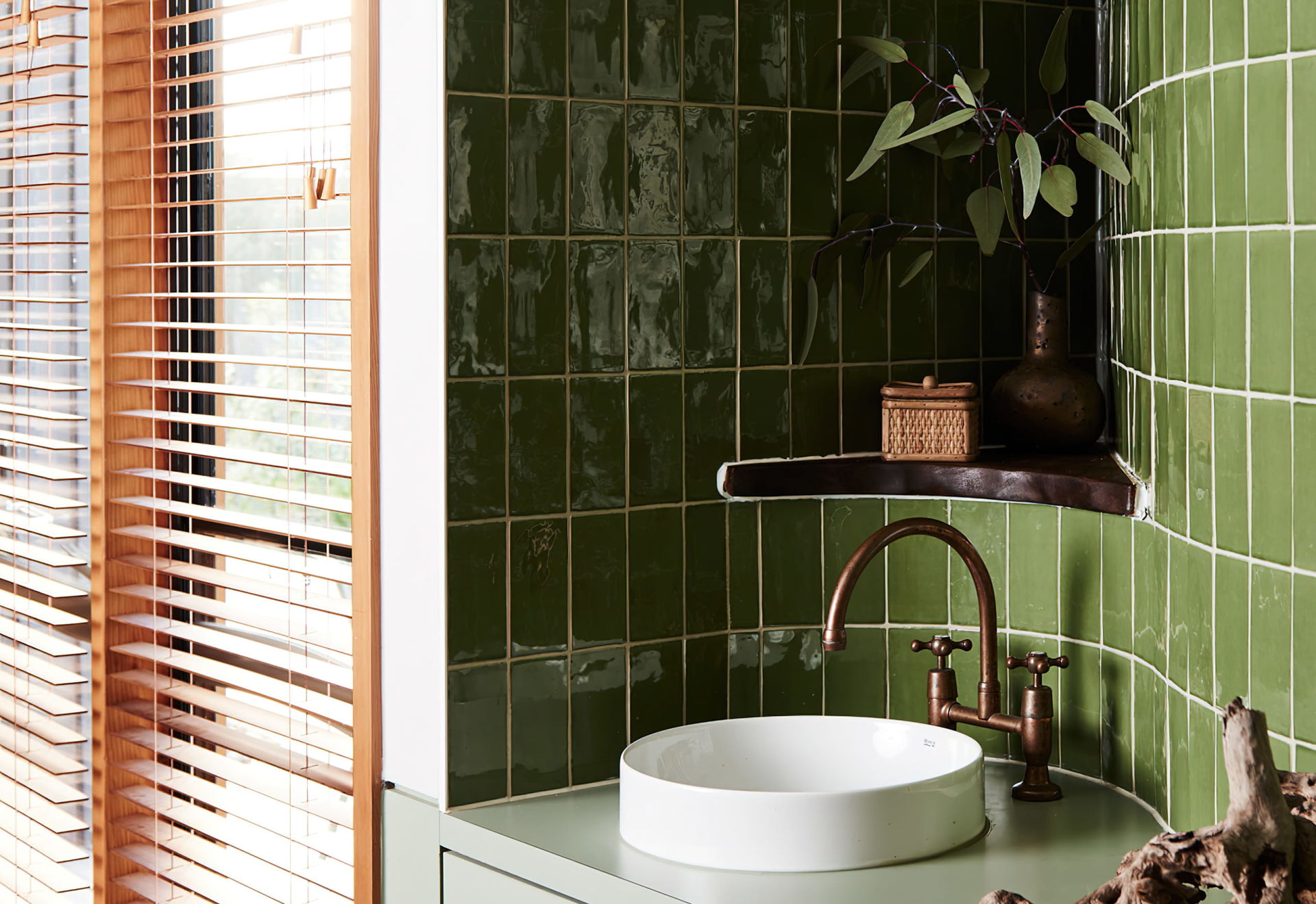 Wellness Centre_curved bathroom vanity_green tiles 