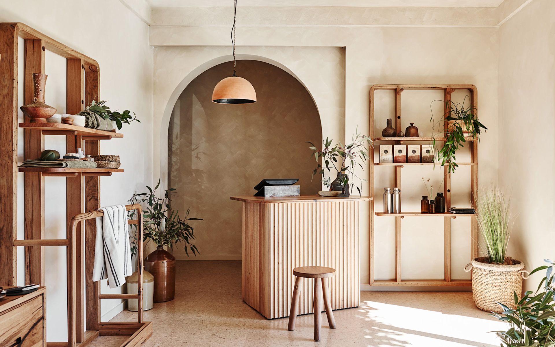 pop up retail store_limewash walls_arch entry
