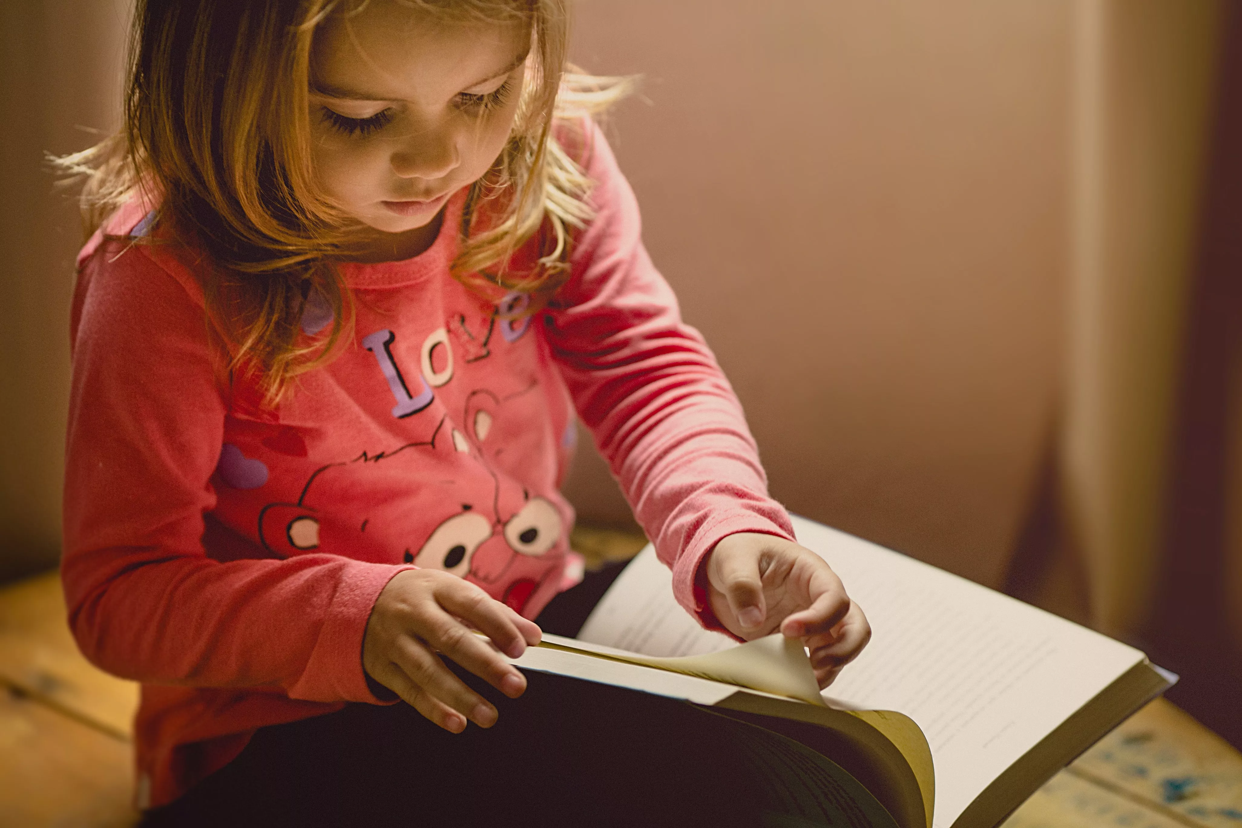 child reading a book