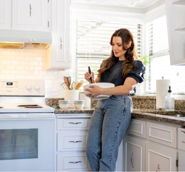 woman-stirring-bowl-mobile