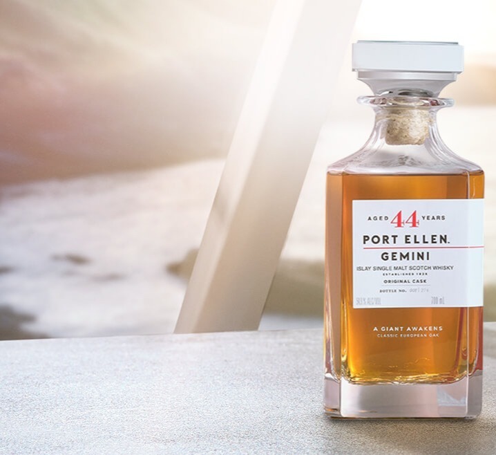 A close-up of a Port Ellen 44-Year-Old 'Gemini' Single Malt Scotch Whisky bottle.