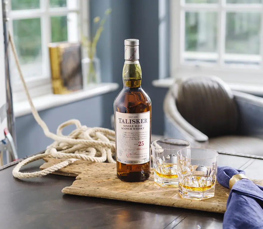 Talisker 25 Year old bottle and serves