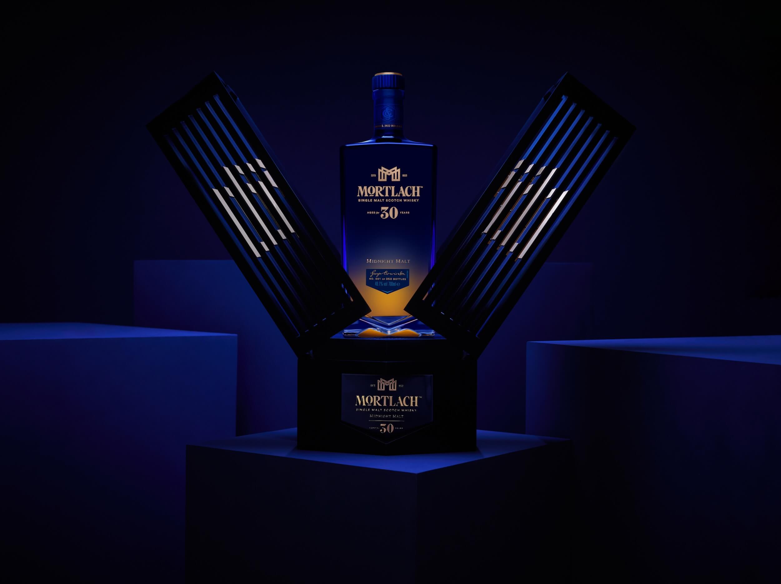 A dark, luxurious setting featuring a bottle of Mortlach 30-Year-Old Single Malt Scotch Whisky