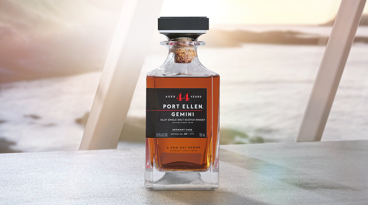 A close-up of a Port Ellen 44-Year-Old 'Gemini' Single Malt Scotch Whisky bottle.