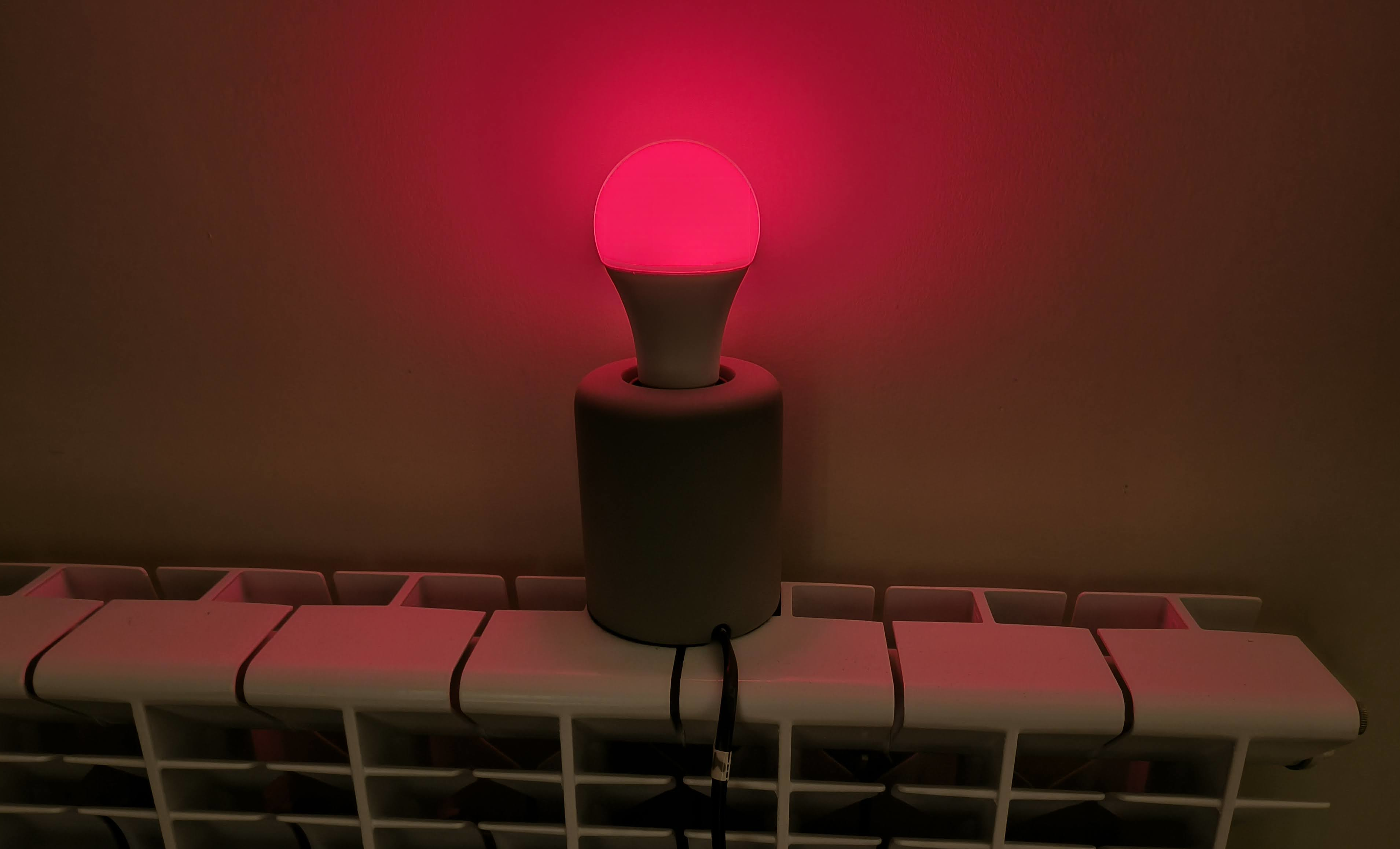 A Zigbee E27 on an IKEA light stand. I have one of these indicators in each room. The light turns orange during "preemptive" alerts, red during active ones, and green once the all clear is received.