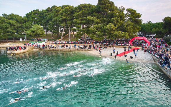 Contestants swimming towards the finish line
