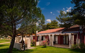 If you like your accommodation to be so close to the beach you can hear the murmur of the sea from your window; you'll love Apartments Sol Amfora. Blessed with a shaded terrace and
a grilling station, these family apartments located within Stella Maris Resort are minutes away from the children's pool and the waterpark with sprinklers, slides and all kinds of fun water
effects. Lots of available activities, excursions and adventure will keep even the liveliest of families entertained through the day (if the beach is not the only option). You could cycle into
the rolling hills of Istria, visiting picturesque villages and quaint taverns, adore the landscape or get a boat and explore north and south from your location. Beaches are Blue Flag clean and
beautiful. Great fitness classes might inspire your family to pursue Zumba, Pilates and weight training and return from holiday in better shape than when you left. There is a nightclub near the
reception if you feel like dancing and a lot of evening entertainment of all kinds, every evening during the season. Visit us in Umag, Croatia - see you there!