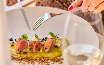Woman eating in a restaurant