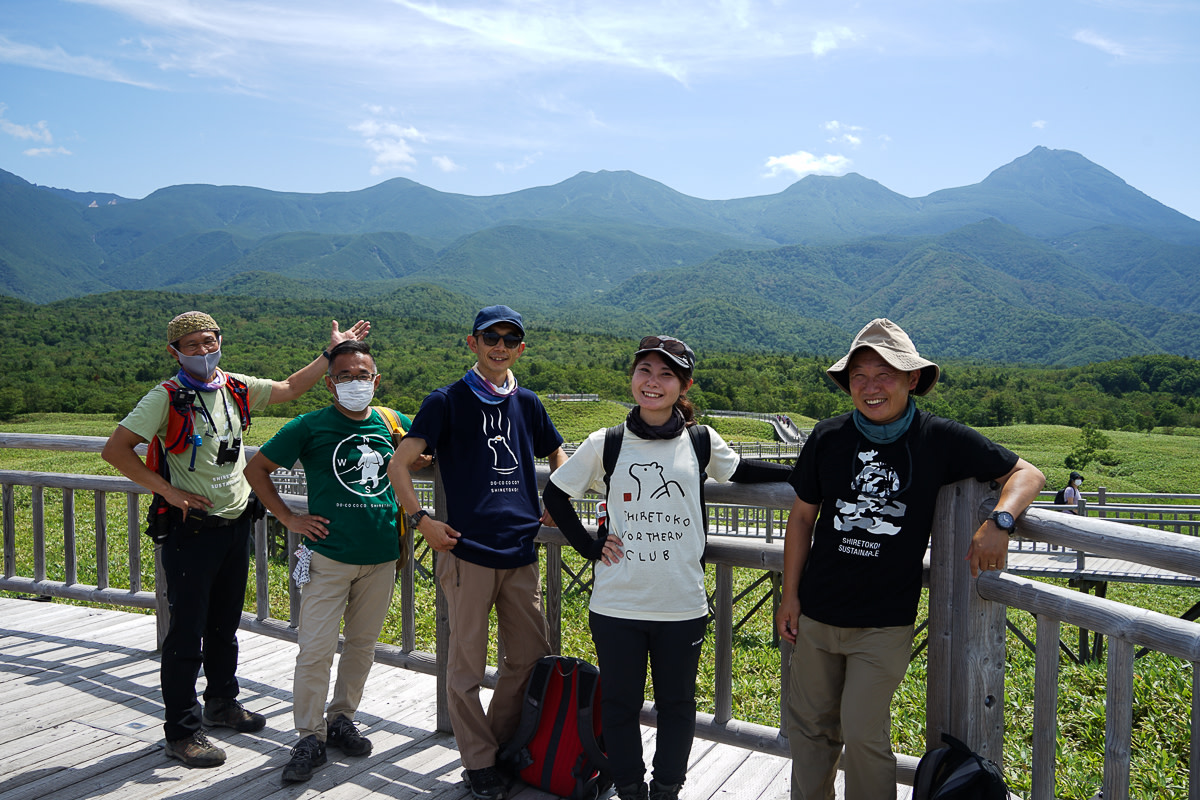 Group picture with the Shiretoko Mountains on the backdrop