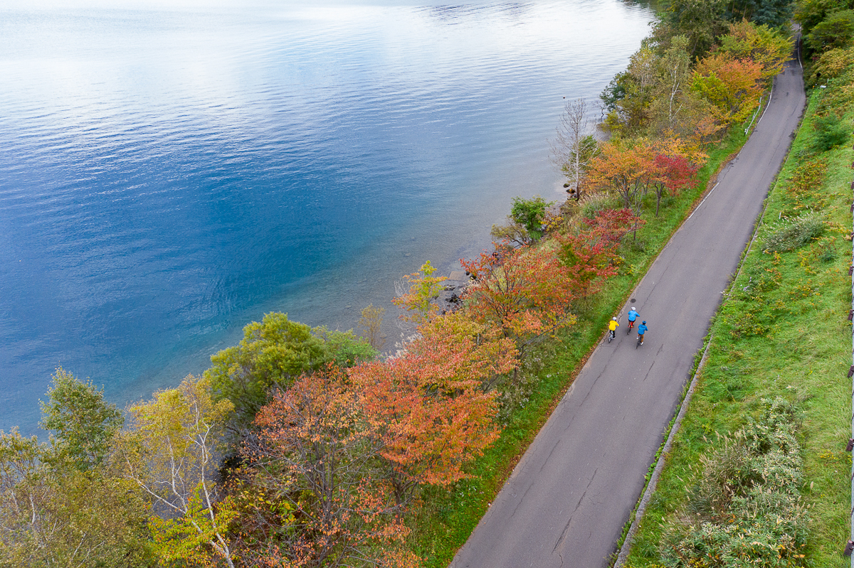 Cycling by Lake Toya in autumn