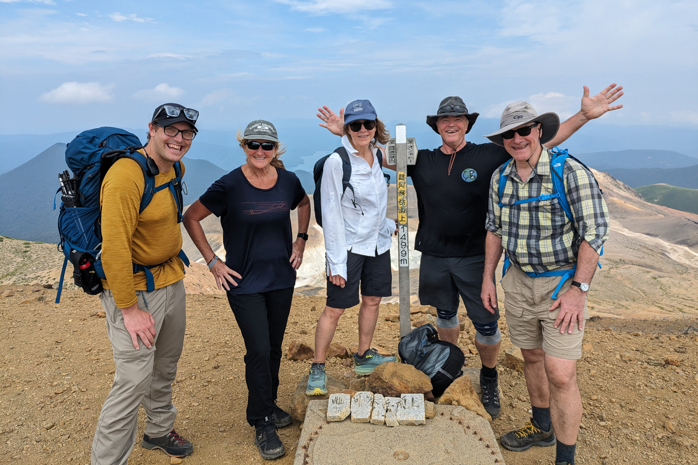 Guests and Adventure Hokkaido guide Richard, at the summit of Mt. Meakan.
