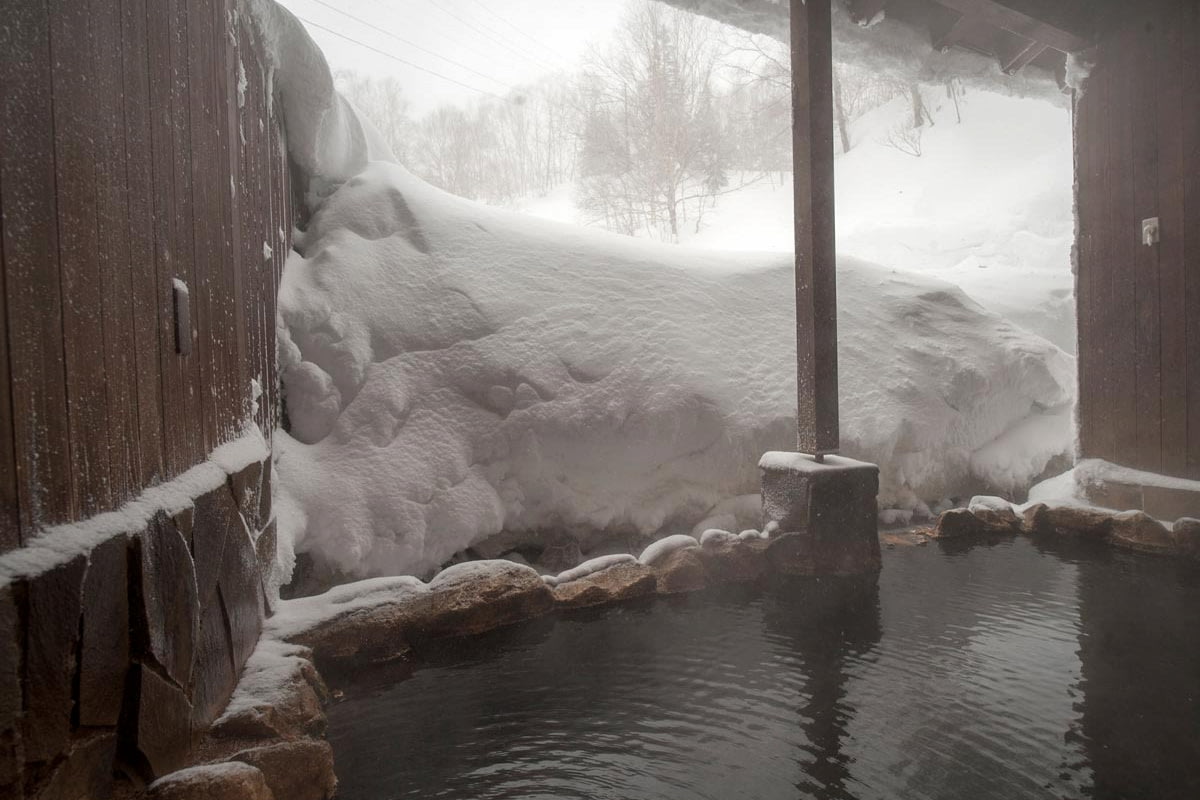 Outdoor spa at Asahidake Onsen in winter