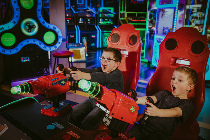 Kids playing games in the arcade