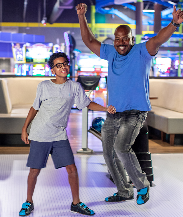 Father and son bowling