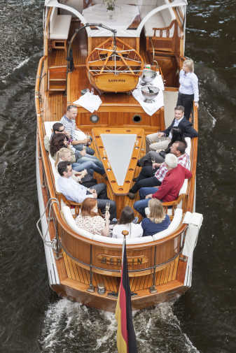 Boat tour across the Spree with passengers