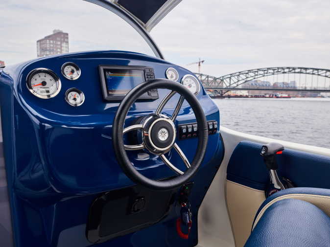 Steering wheel on the motorboat Xela