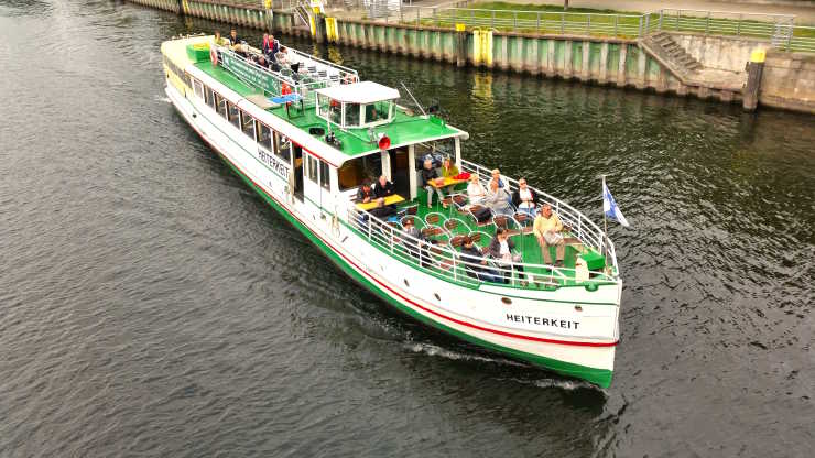 The party ship Heitkeit with a large upper deck on a boat tour through Spandau