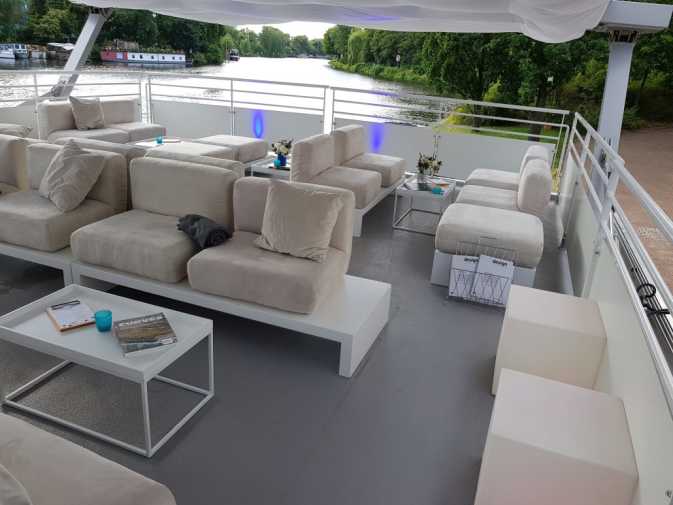 Roof terrace of the seminar ship with lounge furniture