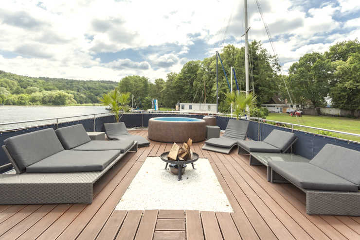Sun deck with whirlpool and lounge furniture on Jaxs
