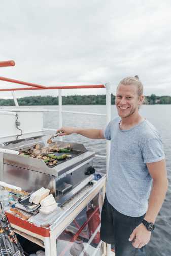 Captain Julian at the grill of the Mathilda