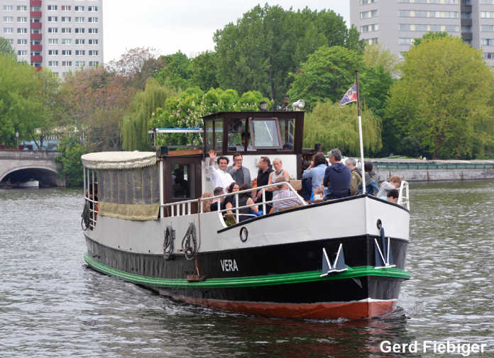 Party ship Vera on a boat trip in front of Fischerinsel with guests on board