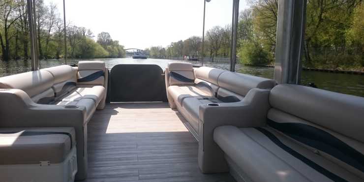 Raft Barracuda from Berlin boat rental with comfortable sofas on board