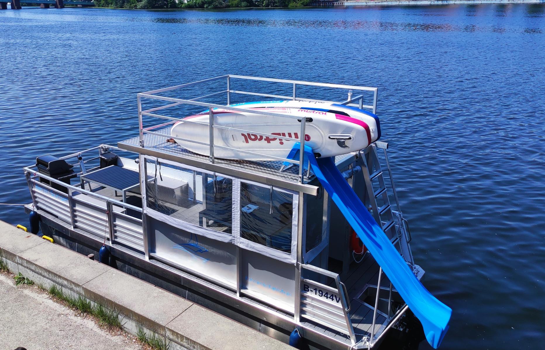 Party Raft with slide and grill raft rental Lake Tegel