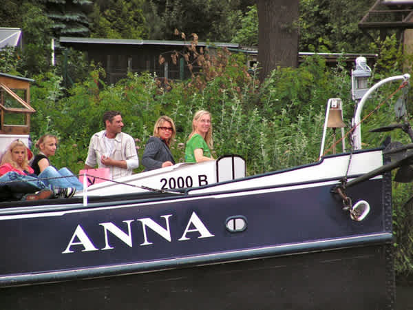Happy passengers on the bow of Anna