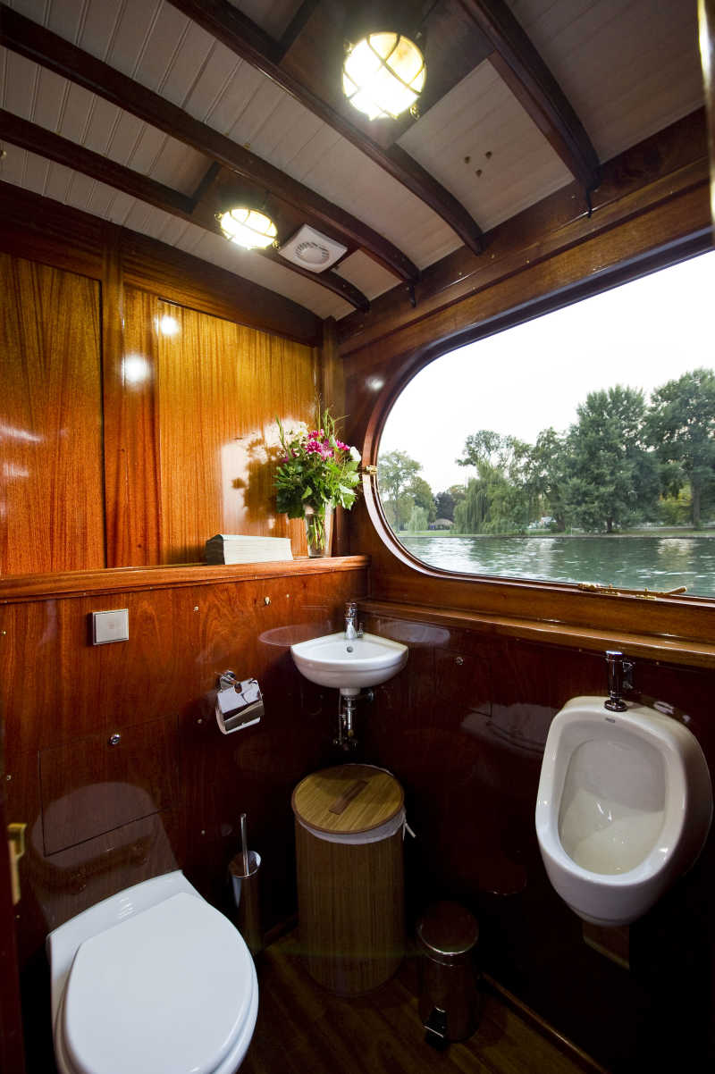 Bathroom with sink and toilet on the Sir Peter yacht