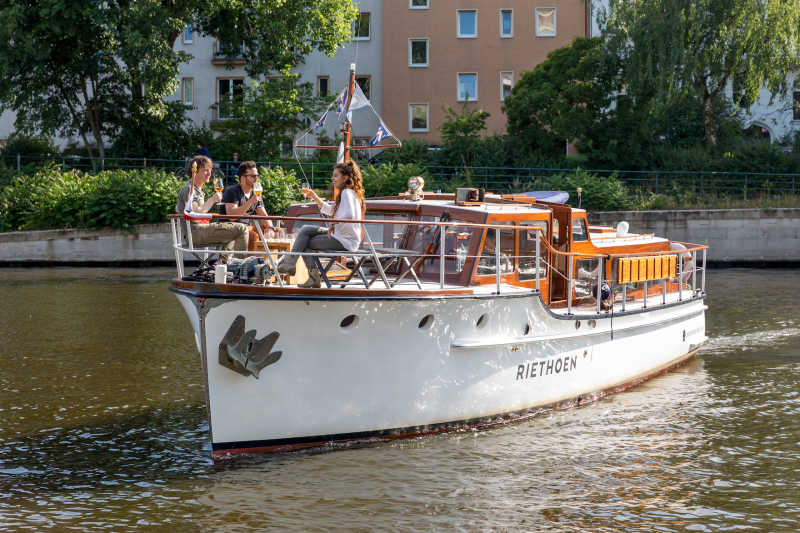 Foredeck of the party boat Riethoen with guests on a Spree tour