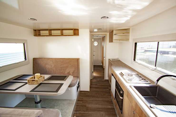The houseboat has an inviting kitchen-living room.