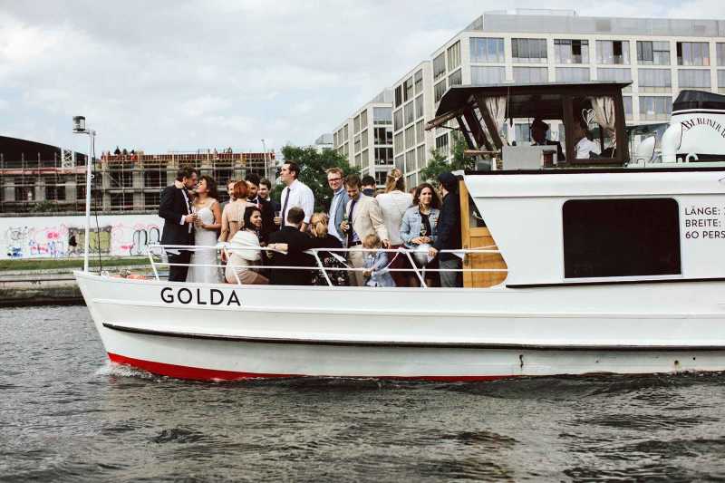 Boat trip with newlyweds and guests on the bow of the Berlin ship Golda
