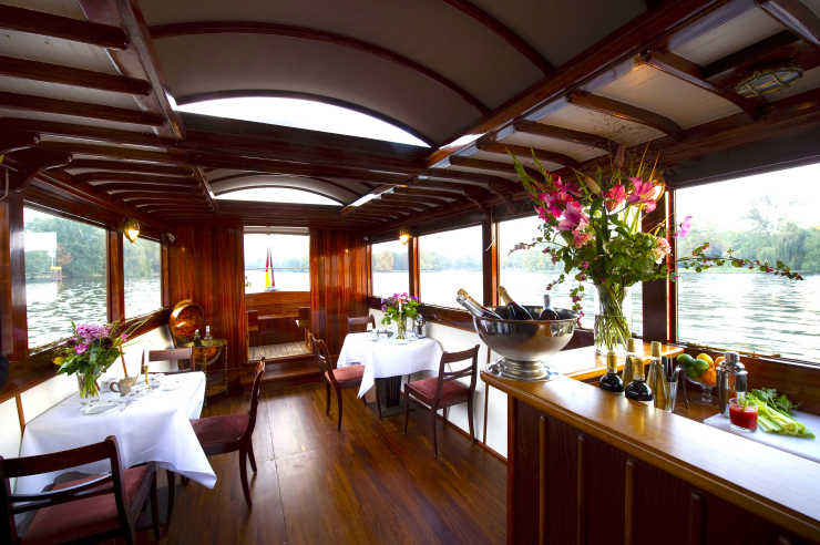 Elegant tropical wood salon on the Sir Peter party boat