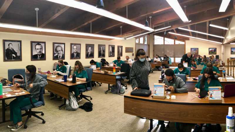 PA class studying socially distant in Ernst Board Room 